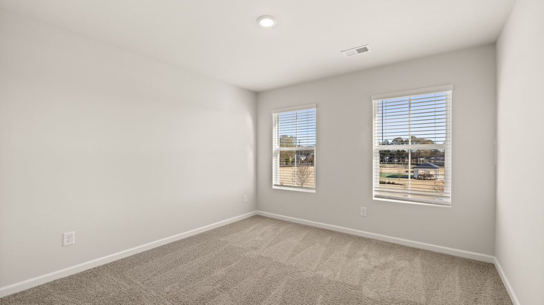 Spacious, unfurnished interior of a new home in Brookland Commons, Monroe (Image 22).