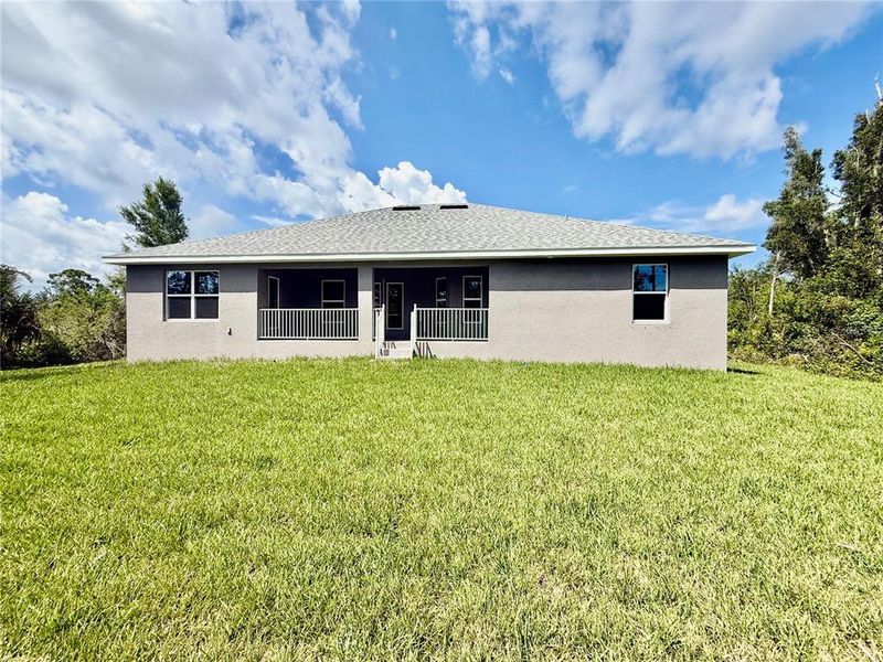 Front exterior of a new home in Port Charlotte, Port Charlotte, FL, highlighting curb appeal (Image 2).