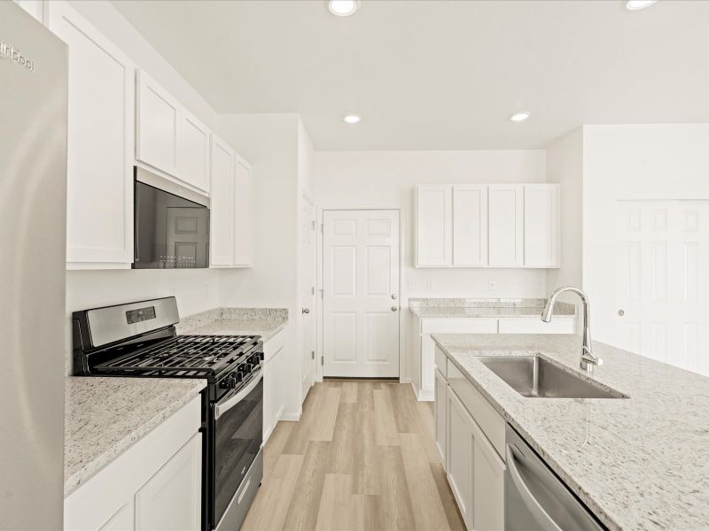 Furnished interior view inside a new home in Lorson Ranch : The Springs Collection, Colorado Springs (Image 4).