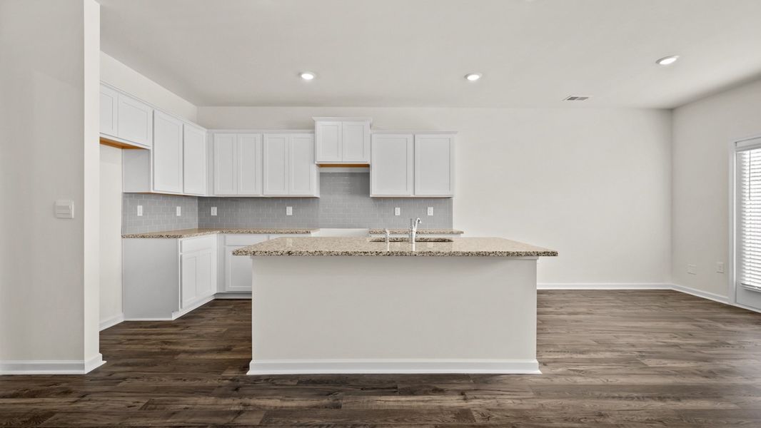 Representative furnished interior of a home built from the Salisbury by D.R. Horton in Inverness at Sugarloaf, Lawrenceville (Image 6).