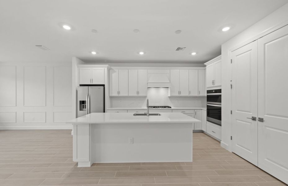 Representative furnished interior of a home built from the Concord by DiVosta in Talon Preserve on Palmer Ranch, Nokomis (Image 13).