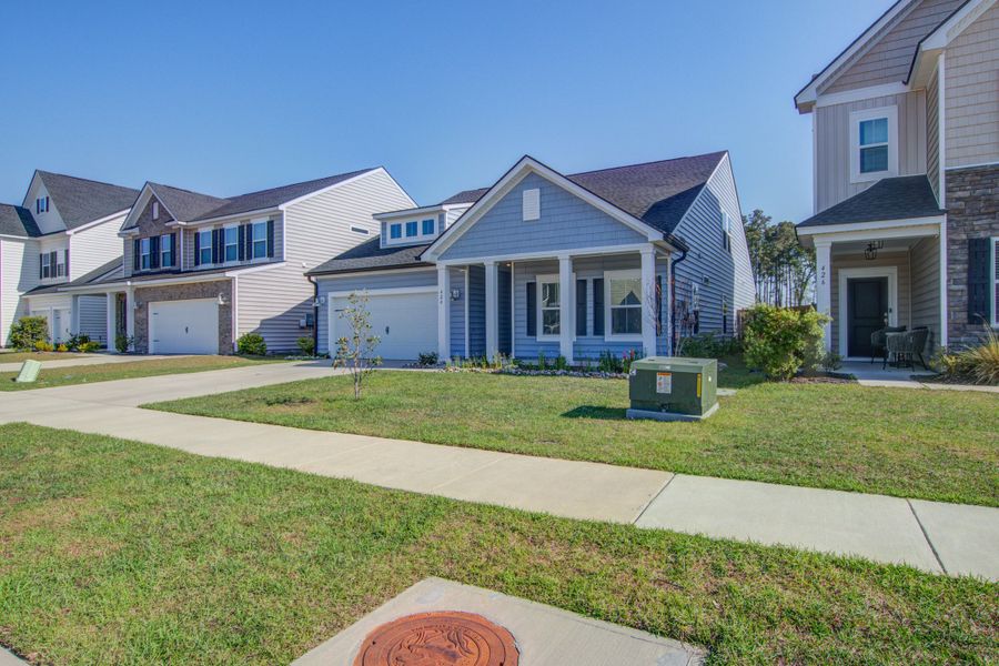 Front exterior of a new home in , Moncks Corner, SC, highlighting curb appeal (Image 26).