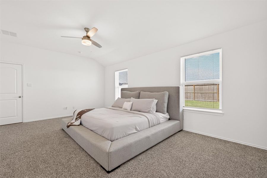 Furnished interior view inside a new home in Sunterra, Katy (Image 11).