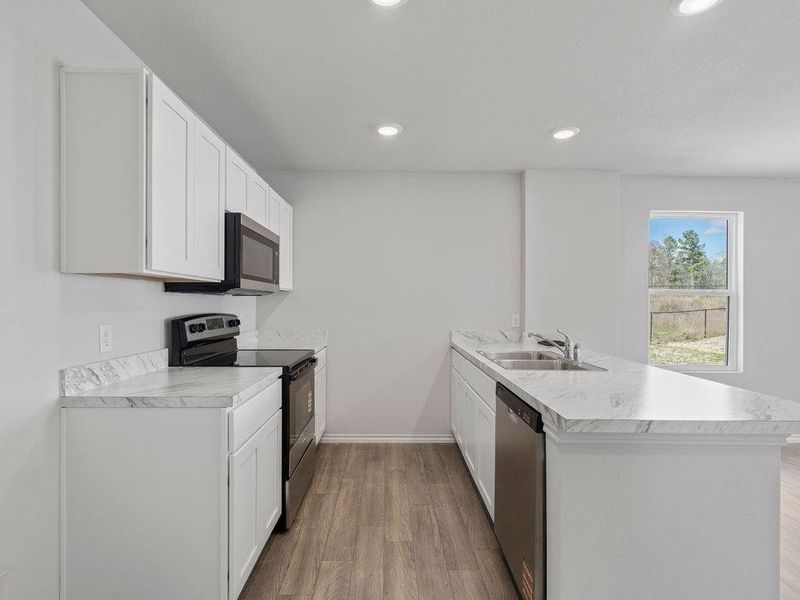 Furnished interior view inside a new home in Stoney Ridge, Hudson (Image 3).