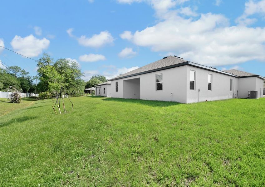 The back yard has plenty of room for activities for the family