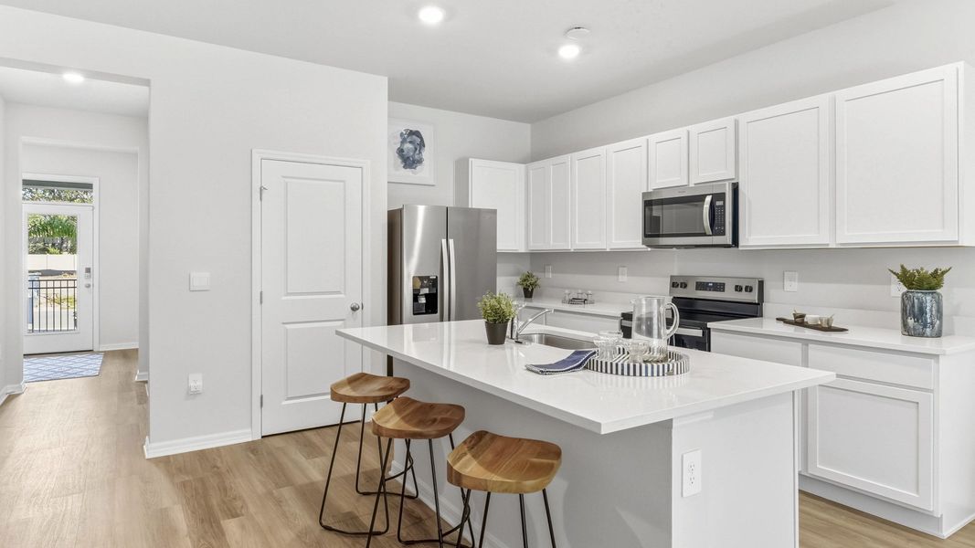 Furnished interior view inside a new home in The Gardens at Bay Street, Sarasota (Image 9).