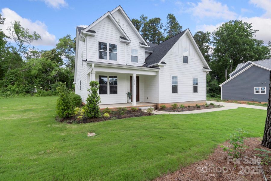 Front exterior of a new home in Crescent Golf, Salisbury, NC, highlighting curb appeal (Image 2).
