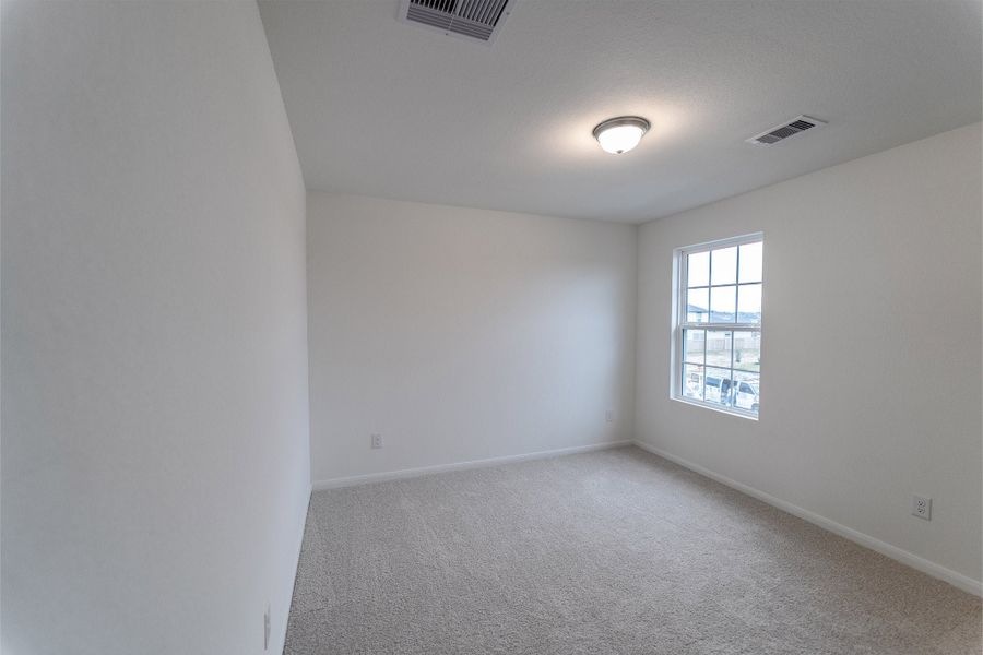 Spacious, unfurnished interior of a new home in Sweetgrass Village, Crosby (Image 31).