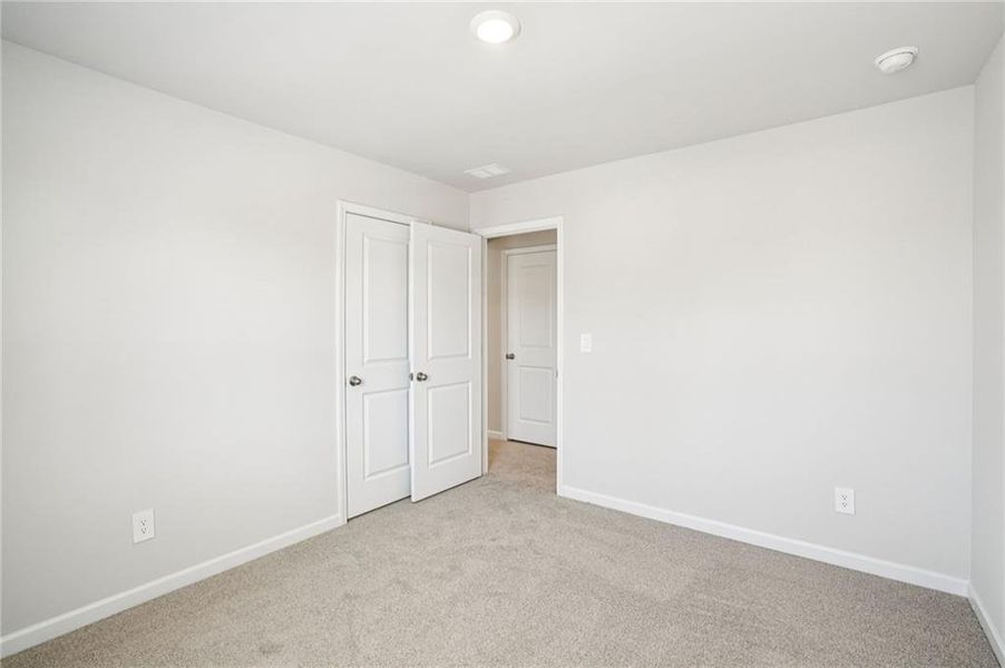 Spacious, unfurnished interior of a new home in Hawthorne Station, College Park (Image 29).