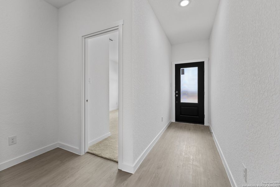 Spacious, unfurnished interior of a new home in Waterwheel: Coastline Collection, San Antonio (Image 20).