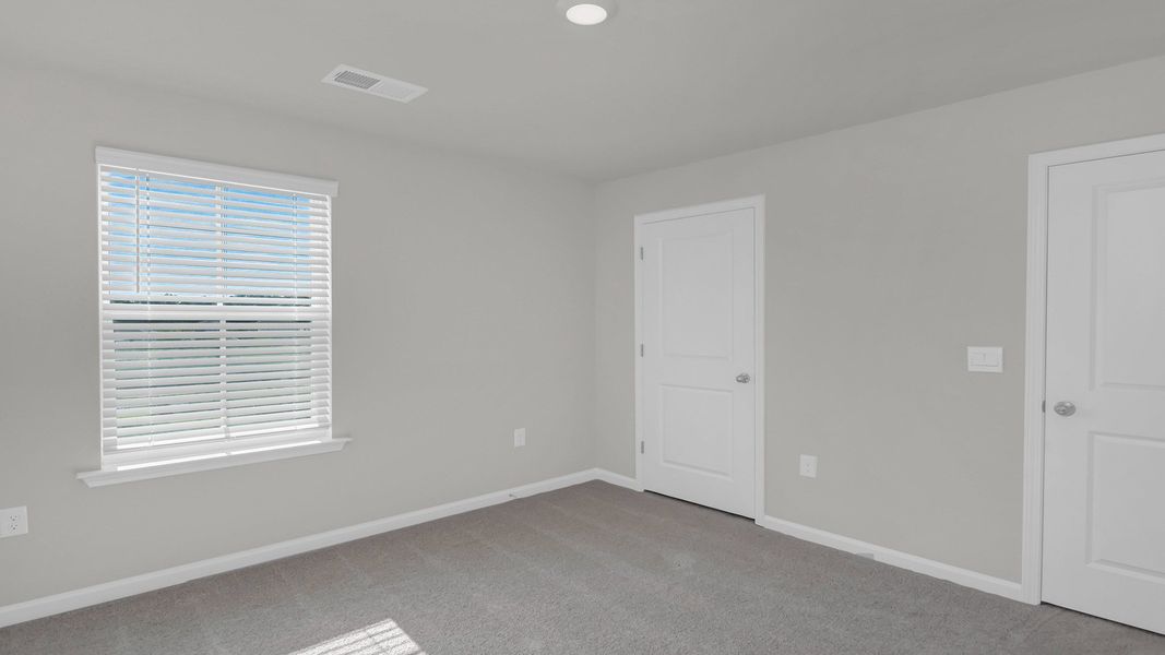 Representative unfurnished interior of a home built from the ROBIE by D.R. Horton in Ferry Grove, Lexington (Image 35).