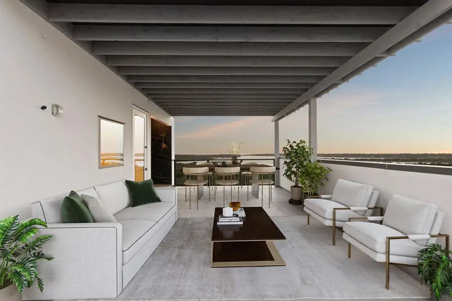 Balcony with an outdoor living space, a patio area, and outdoor dining space