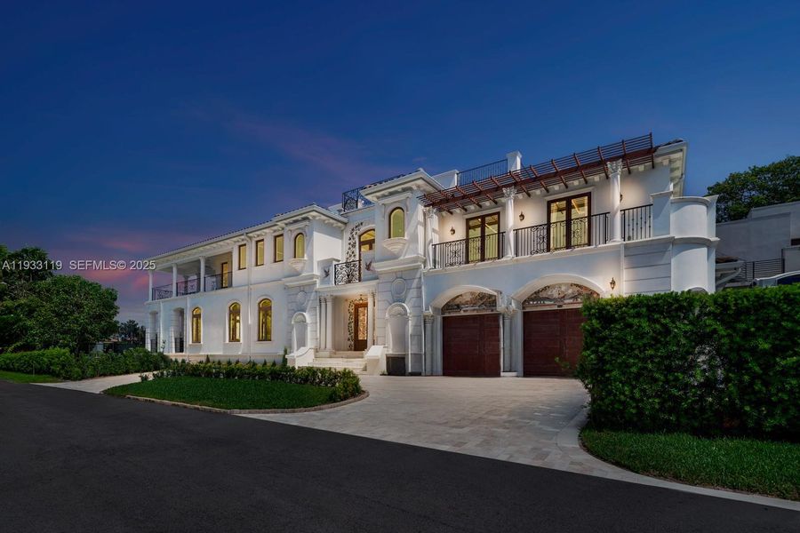 Front exterior of a new home in , Surfside, FL, highlighting curb appeal (Image 23). Front exterior of a new home in , Surfside, FL, highlighting curb appeal (Image 23).