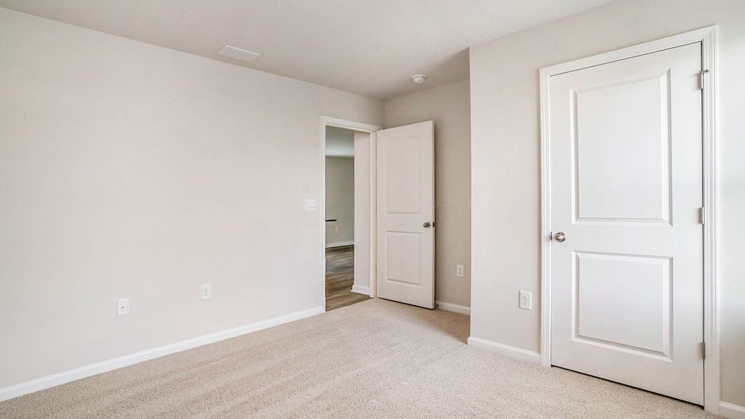 Spacious, unfurnished interior of a new home in Meadow Walk, Loris (Image 16).