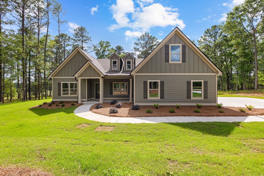 Front exterior of a new home in Golfview, Thomaston, GA, highlighting curb appeal (Image 1).