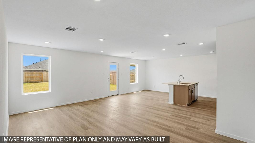 Spacious, unfurnished interior of a new home in Sunterra, Katy (Image 8).