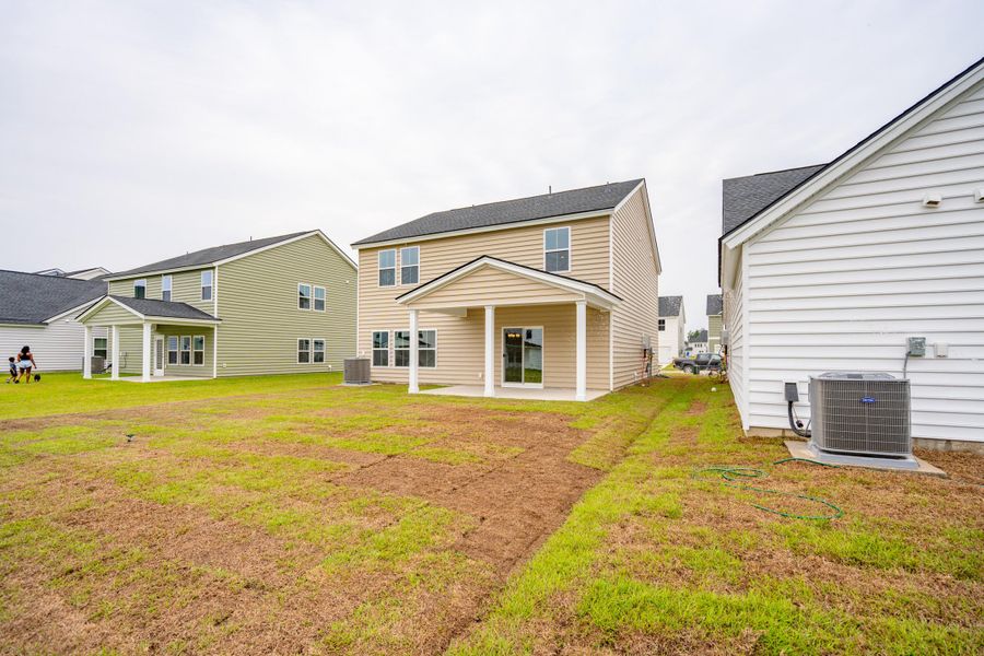 Exterior details and patio area of a home in Heron's Walk at Summers Corner: Carolina Collection, Summerville (Image 23). Exterior details and patio area of a home in Heron's Walk at Summers Corner: Carolina Collection, Summerville (Image 23).