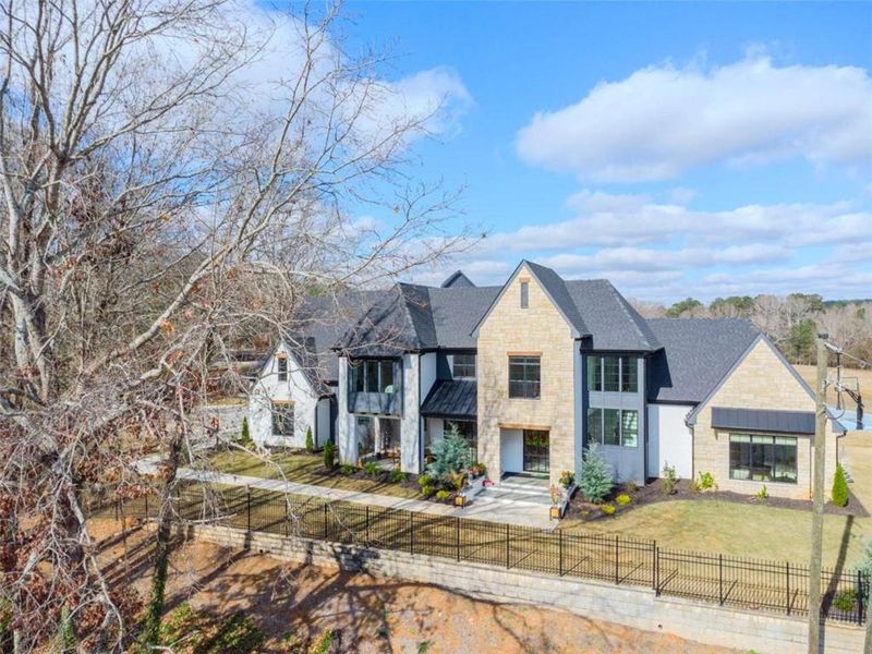 Front exterior of a new home in , Dacula, GA, highlighting curb appeal (Image 2).