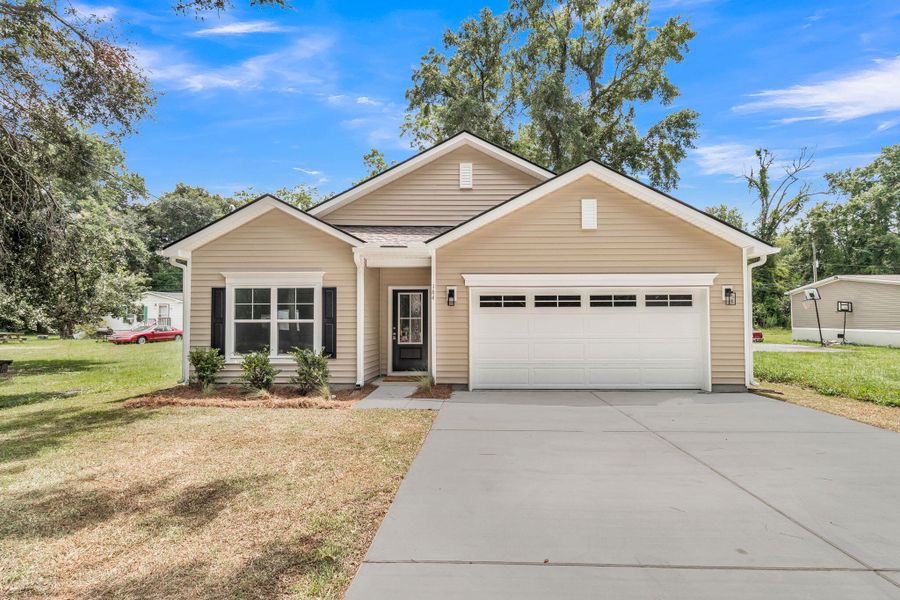 Front exterior of a new home in , Summerville, SC, highlighting curb appeal (Image 1). Front exterior of a new home in , Summerville, SC, highlighting curb appeal (Image 1).