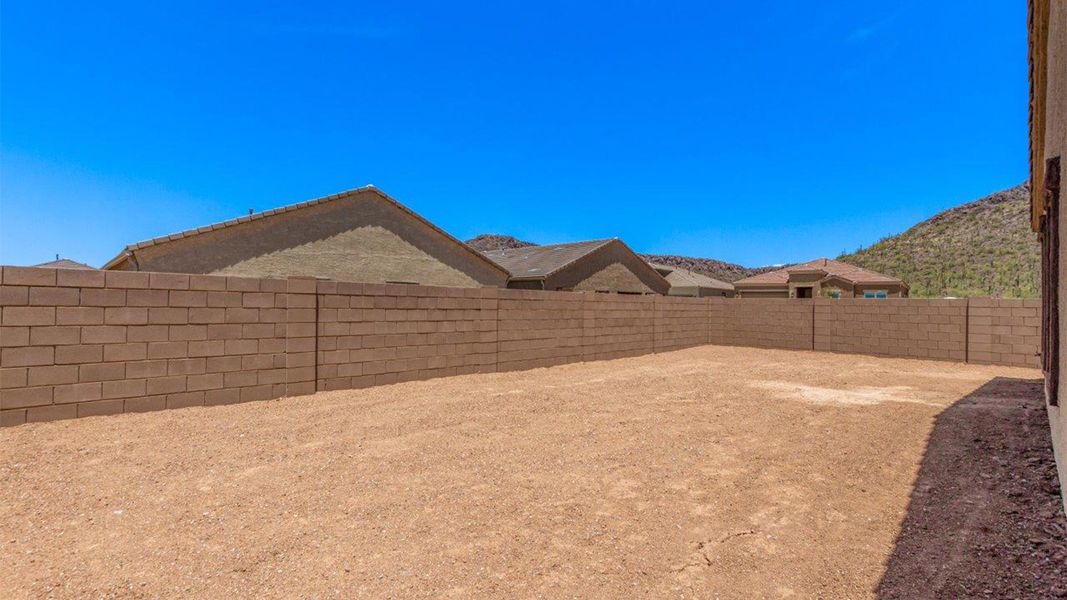 Front exterior of a new home in Sycamore Vista, Vail, AZ, highlighting curb appeal (Image 20).