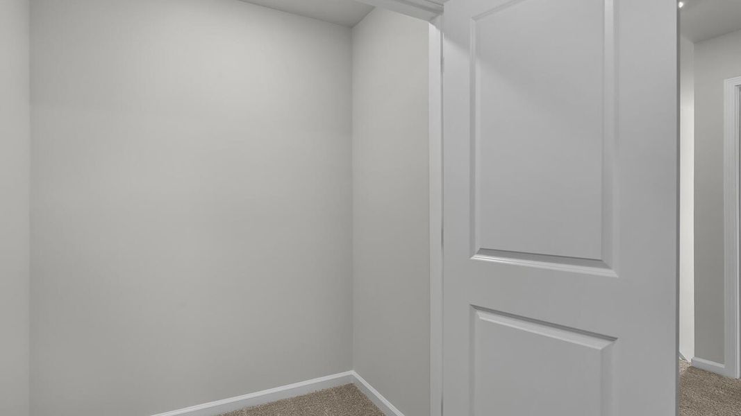 Spacious, unfurnished interior of a new home in Grayson Park Duets, Leland (Image 29).