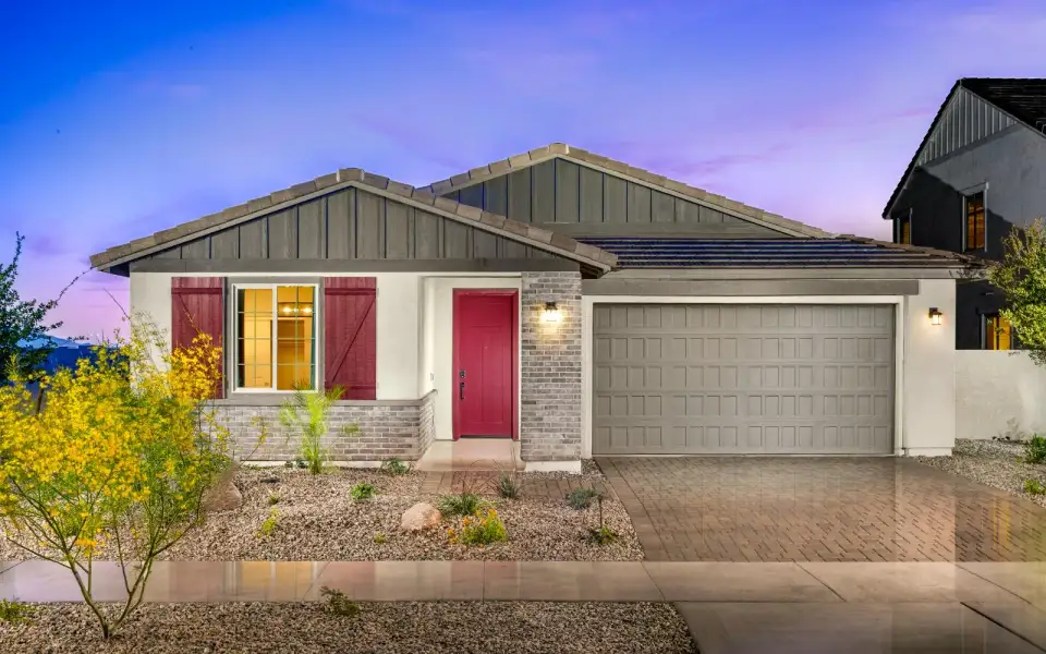 Front exterior of a new home in Blossom Rock, Apache Junction, AZ, highlighting curb appeal (Image 2). Front exterior of a new home in Blossom Rock, Apache Junction, AZ, highlighting curb appeal (Image 2).
