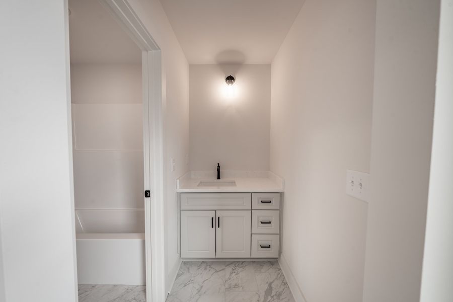 Representative exterior photo of a completed home built from the Ivy by Norfleet Builders in Cambria, White House, TN (Image 19).