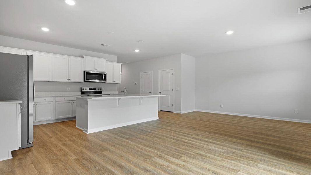 Furnished interior view inside a new home in Garbon Fields, Summerville (Image 12).