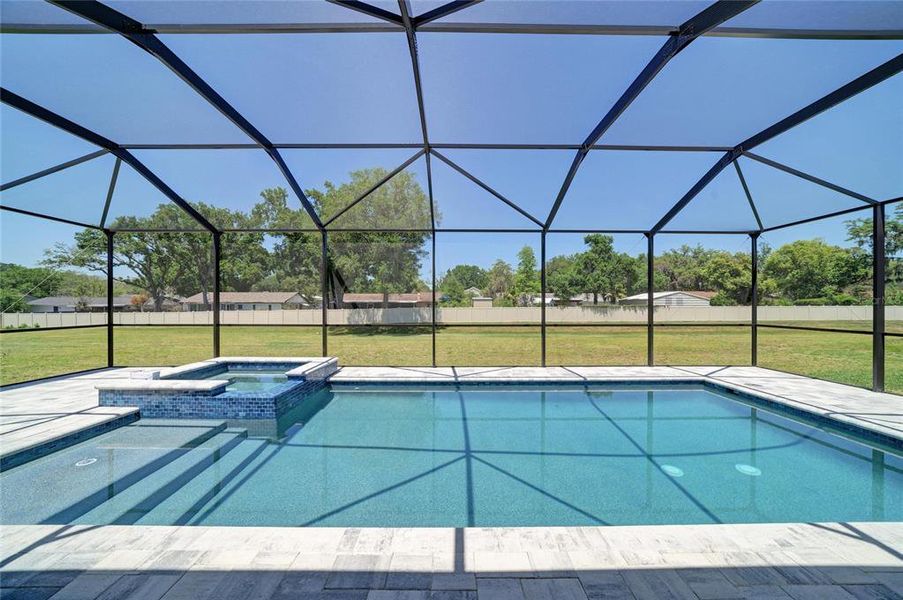 Exterior details and patio area of a home in Hidden Lakes, Brandon (Image 24).