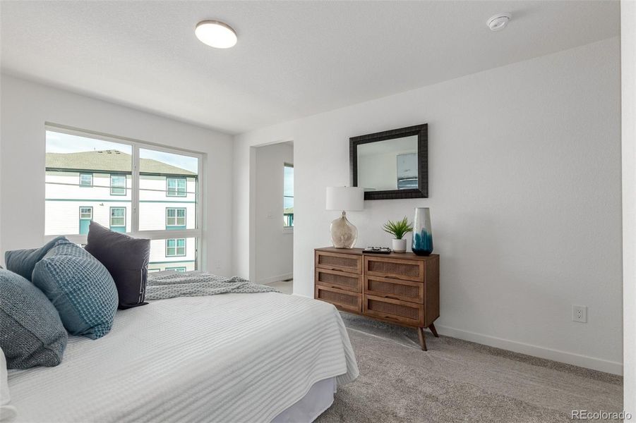 Furnished interior view inside a new home in The Commons at Victory Ridge, Colorado Springs (Image 13).