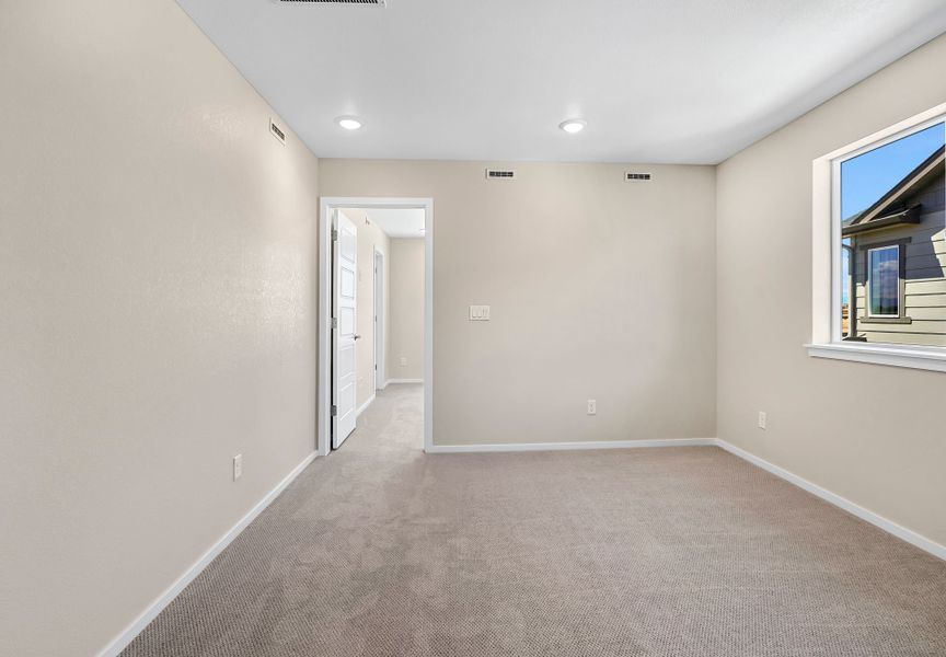 Spacious, unfurnished interior of a new home in Barefoot Village, Firestone (Image 13).