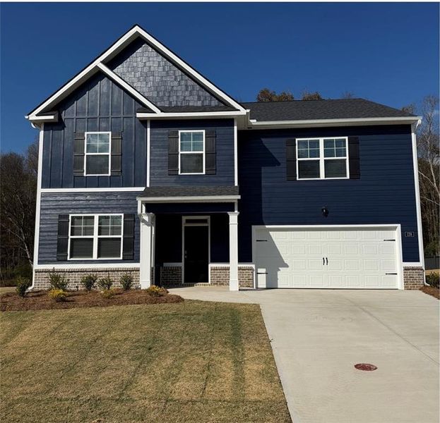 Front exterior of a new home in Jackson Landing, Jefferson, GA, highlighting curb appeal (Image 20).