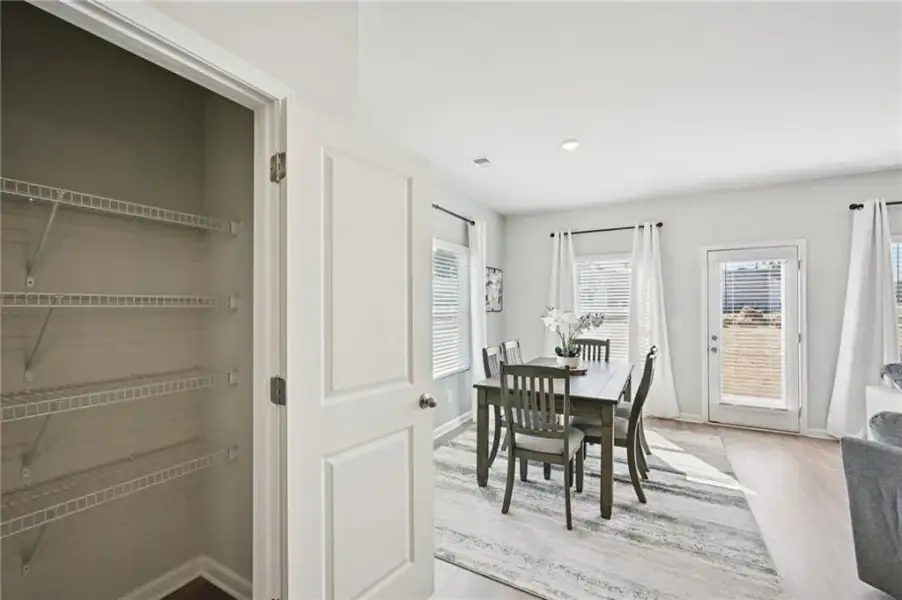 Furnished interior view inside a new home in Cash's Crossing, Ellenwood (Image 6).