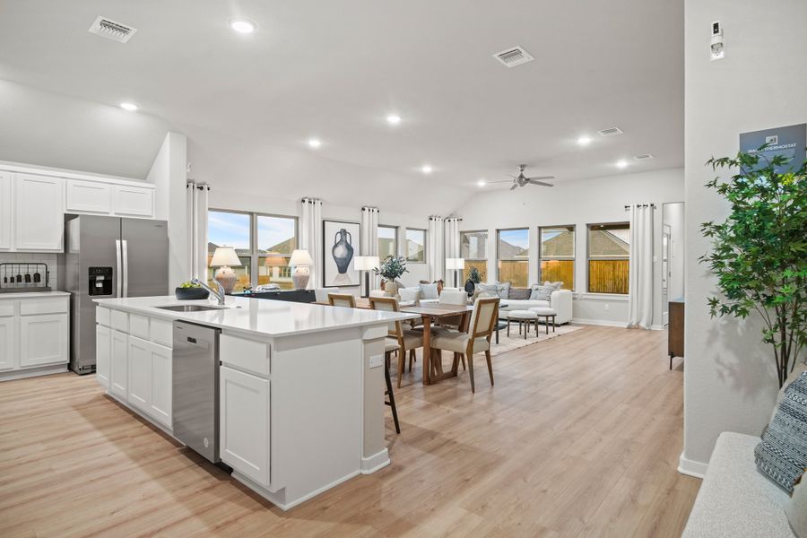 Kitchen in the Diamond home plan by Trophy Signature Homes – REPRESENTATIVE PHOTO