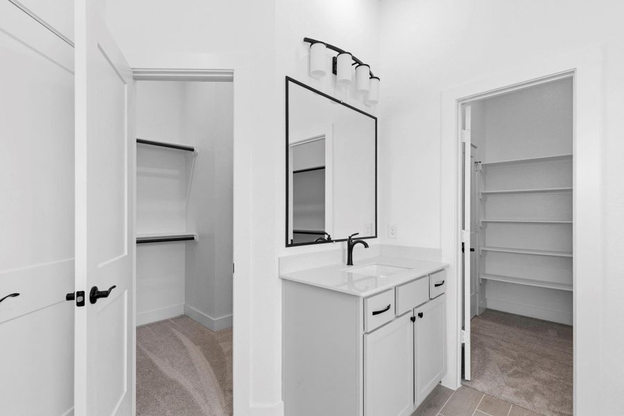 Furnished interior view inside a new home in Bridgeland, Cypress (Image 9).