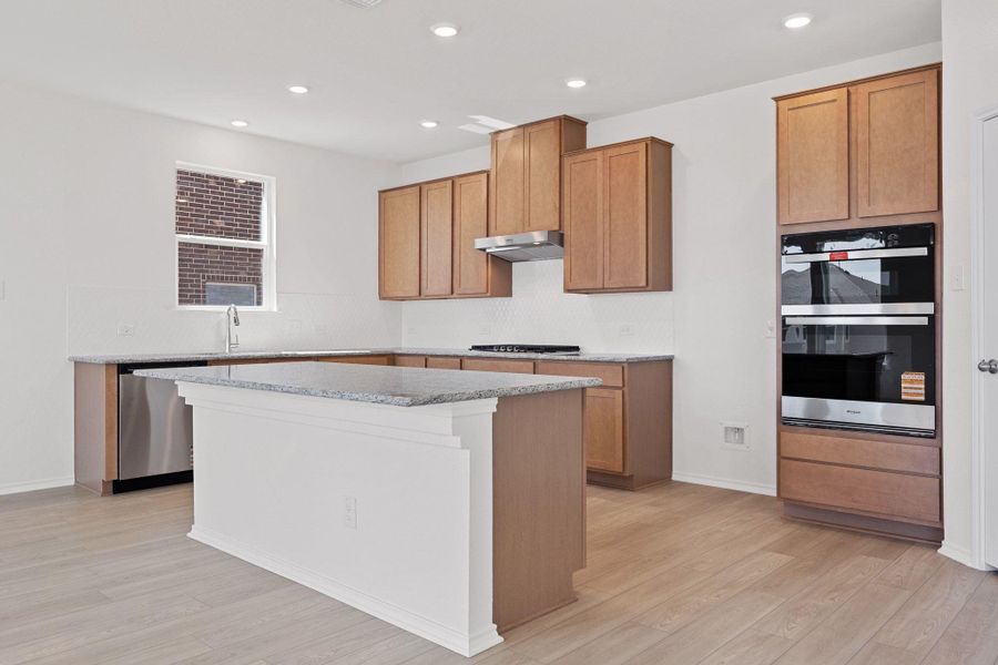 Furnished interior view inside a new home in Salerno - Classic Collection, Round Rock (Image 12). Furnished interior view inside a new home in Salerno - Classic Collection, Round Rock (Image 12).