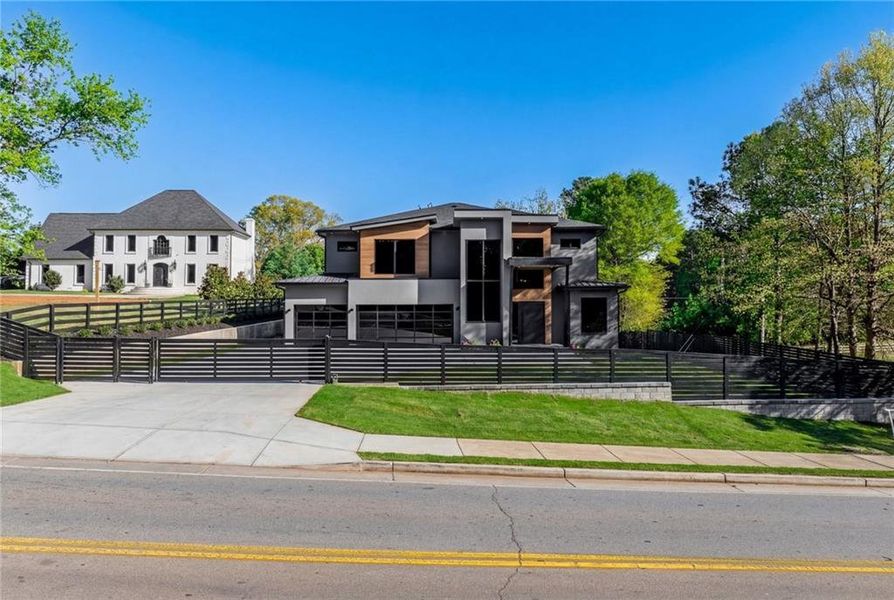 Front exterior of a new home in , Sugar Hill, GA, highlighting curb appeal (Image 25). Front exterior of a new home in , Sugar Hill, GA, highlighting curb appeal (Image 25).
