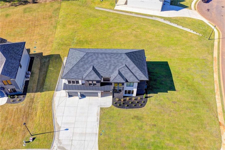 Front exterior of a new home in , Auburn, GA, highlighting curb appeal (Image 29). Front exterior of a new home in , Auburn, GA, highlighting curb appeal (Image 29).