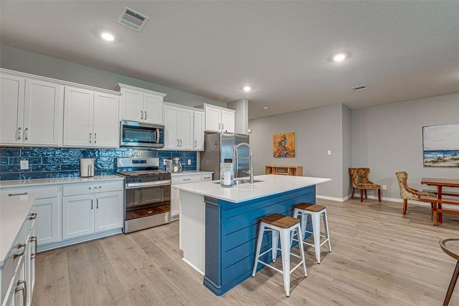 Furnished interior view inside a new home in Fireside by the Lake, Garland (Image 8).