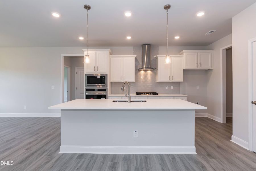 Furnished interior view inside a new home in Kelly Farms, Lillington (Image 6). Furnished interior view inside a new home in Kelly Farms, Lillington (Image 6).