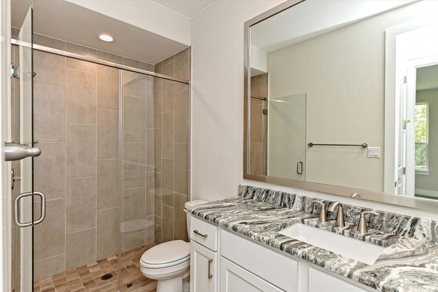 Representative furnished interior of a home built from the Opal by Giddens Homes in Riverstone, Georgetown (Image 13).