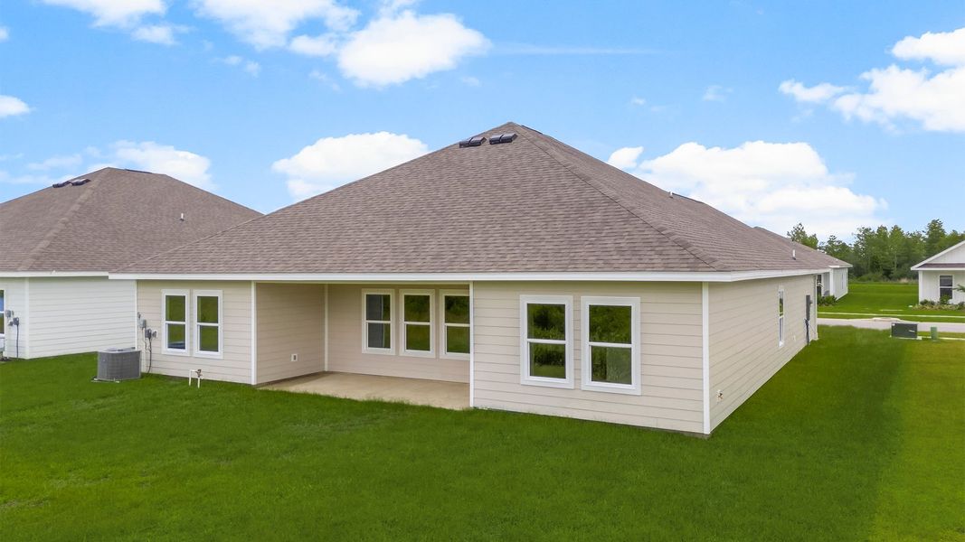 Front exterior of a new home in Liberty, Panama City, FL, highlighting curb appeal (Image 19). Front exterior of a new home in Liberty, Panama City, FL, highlighting curb appeal (Image 19).