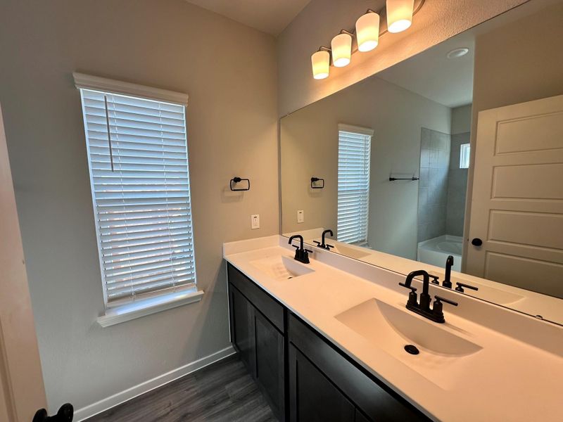 Furnished interior view inside a new home in , Iowa Colony (Image 5).