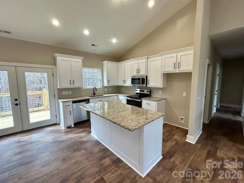 Furnished interior view inside a new home in , Lenoir (Image 5).