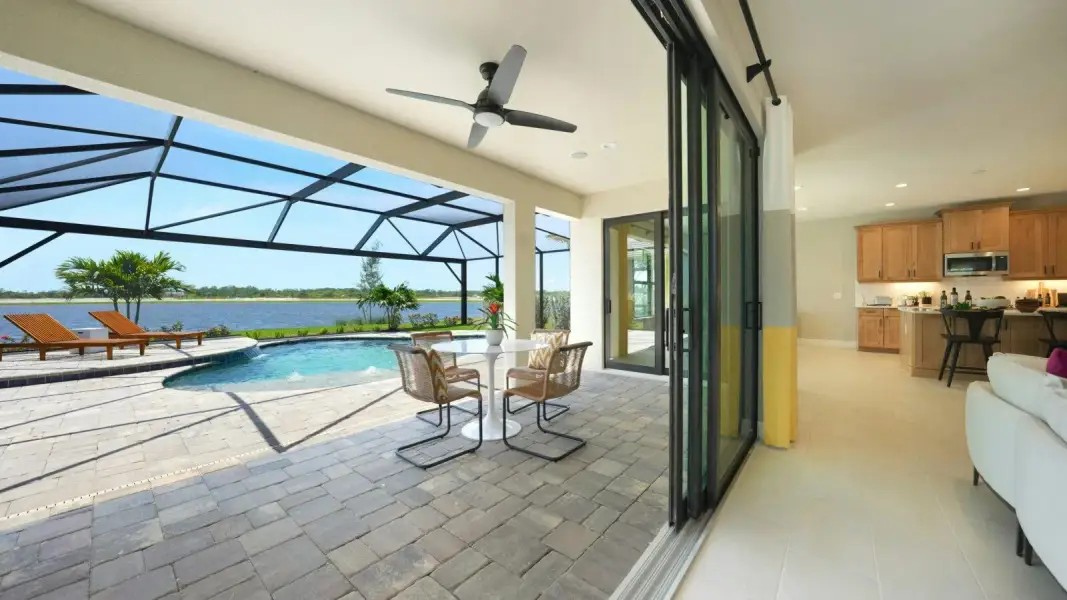 Exterior details and patio area of a home in Kingston South Real Estate and Homes for Sale in Estero, FL - Neal Communities, Estero (Image 3).