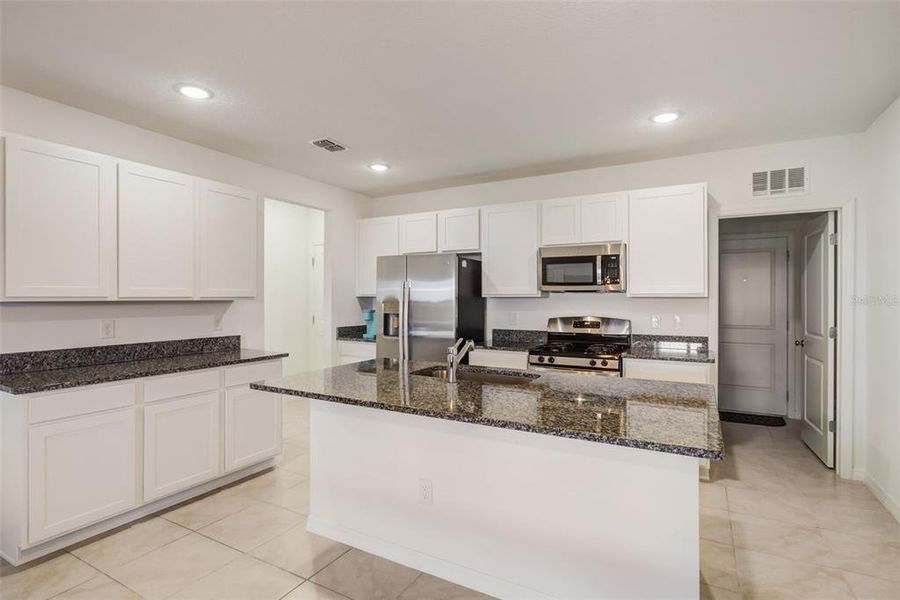 Furnished interior view inside a new home in , Winter Garden (Image 4).
