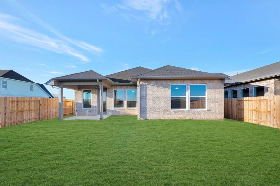 Exterior details and patio area of a home in The Grand Prairie 50’, Hockley (Image 4).