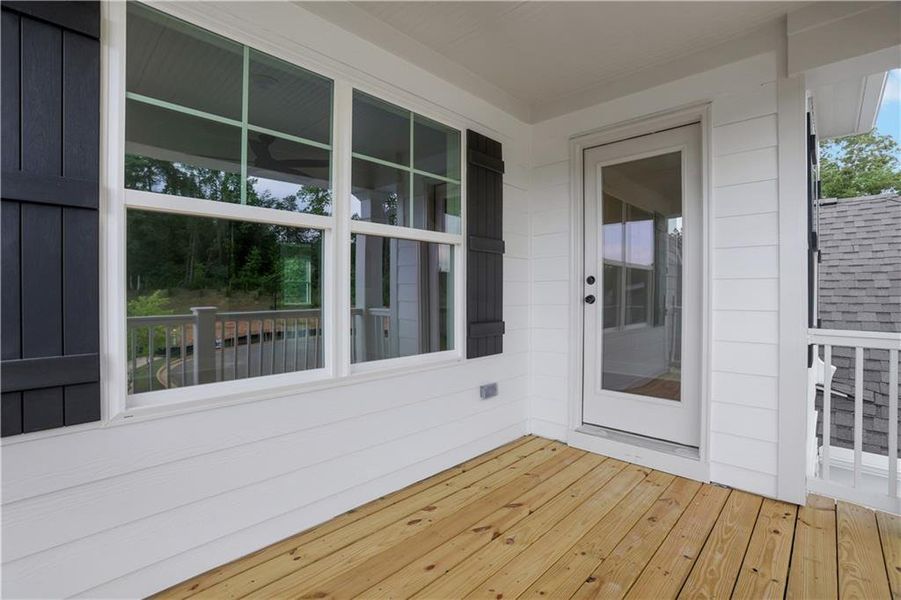 Exterior details and patio area of a home in Marble Tree, Ball Ground (Image 30).