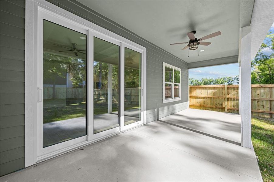 Exterior details and patio area of a home in Grand Oaks, Gainesville (Image 26).