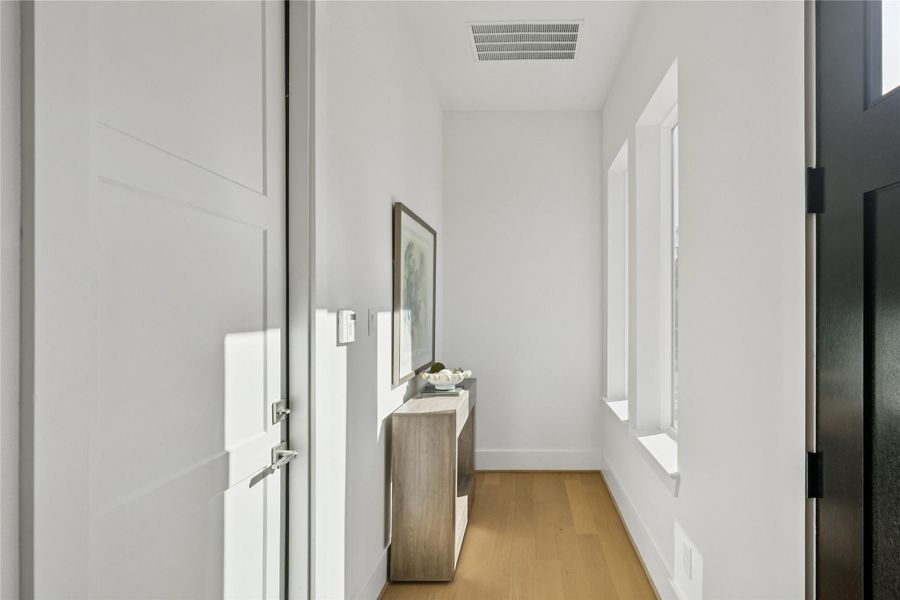 Furnished interior view inside a new home in West 21st Residences, Houston (Image 25).